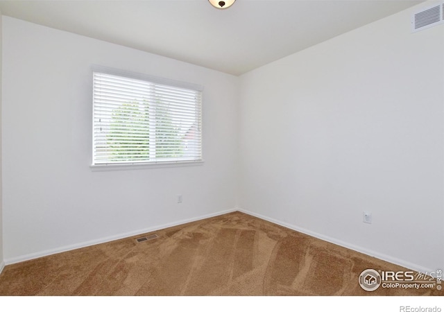 2334 75th Ave, Greeley, CO 80634 - spare room with carpet floors and baseboards