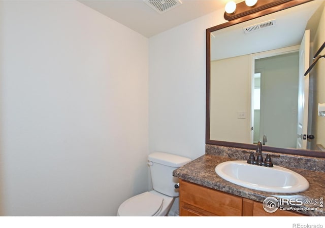 2334 75th Ave, Greeley, CO 80634 - bathroom featuring toilet and vanity