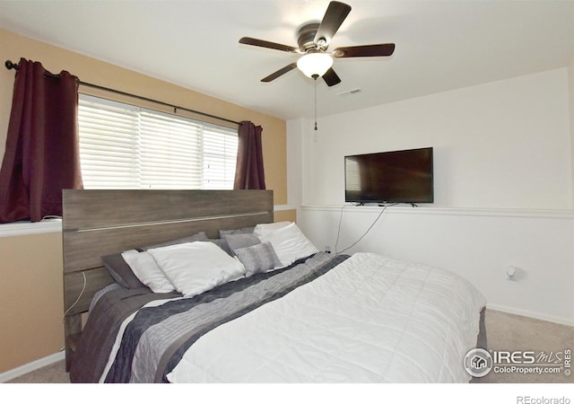 2334 75th Ave, Greeley, CO 80634 - carpeted bedroom featuring baseboards and a ceiling fan