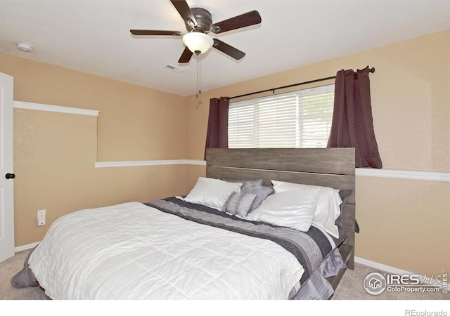 2334 75th Ave, Greeley, CO 80634 - carpeted bedroom with baseboards and a ceiling fan