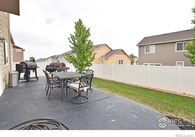 2334 75th Ave, Greeley, CO 80634 - view of patio with outdoor dining space, grilling area, and a residential view