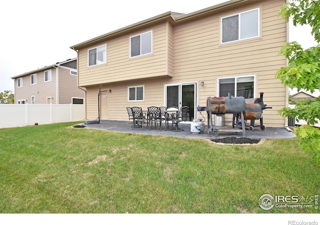 2334 75th Ave, Greeley, CO 80634 - back of house with a patio area