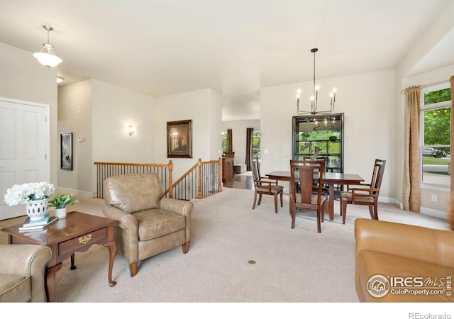 8245 Hidden Cove Ct, Windsor, CO 80528 - living area featuring carpet flooring, a chandelier, and baseboards