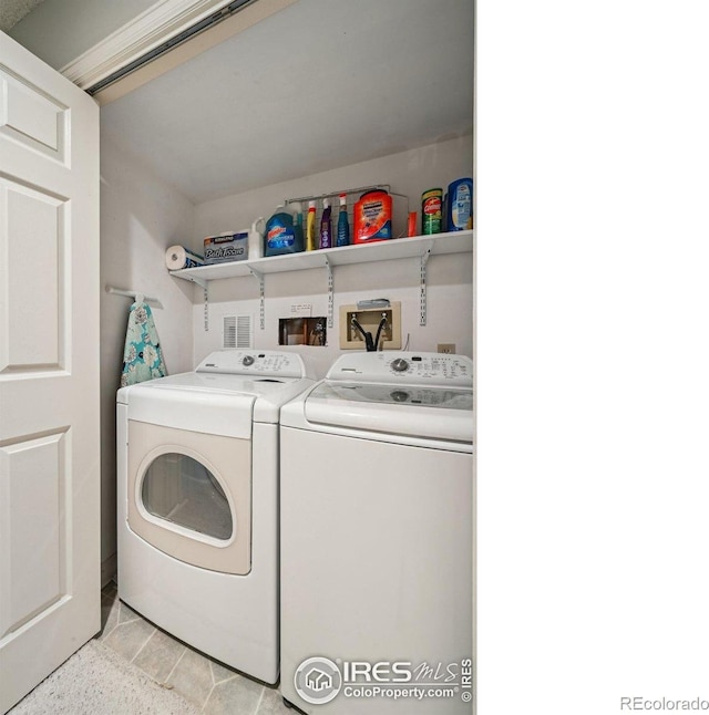 4475 Laguna Pl Unit 201, Boulder, CO 80303 - laundry room featuring independent washer and dryer