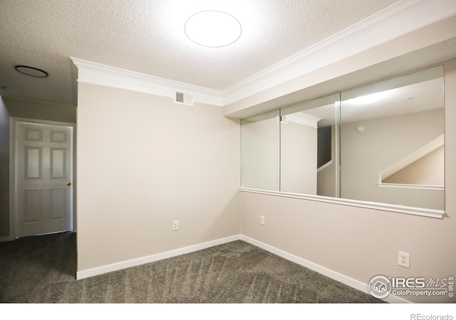 2162 Concord Ln, Superior, CO 80027 - spare room with dark colored carpet, ornamental molding, a textured ceiling, and baseboards