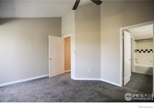 2162 Concord Ln, Superior, CO 80027 - unfurnished bedroom featuring dark colored carpet, baseboards, ensuite bath, a ceiling fan, and a textured ceiling
