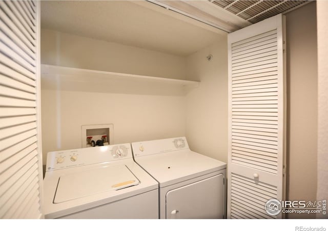 2162 Concord Ln, Superior, CO 80027 - laundry area with separate washer and dryer
