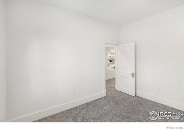 501 Adams Ave, Akron, CO 80720 - unfurnished room featuring carpet floors and baseboards