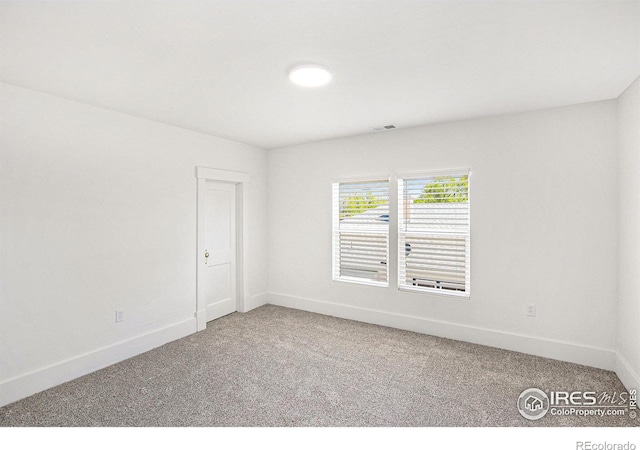 501 Adams Ave, Akron, CO 80720 - empty room with carpet and baseboards