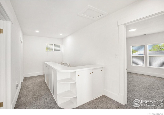 501 Adams Ave, Akron, CO 80720 - hall featuring carpet, baseboards, attic access, and recessed lighting