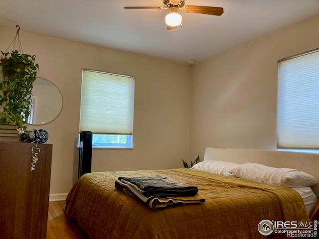 3201 Broadway St, Boulder, CO 80304 - bedroom featuring wood finished floors, ceiling fan, and baseboards
