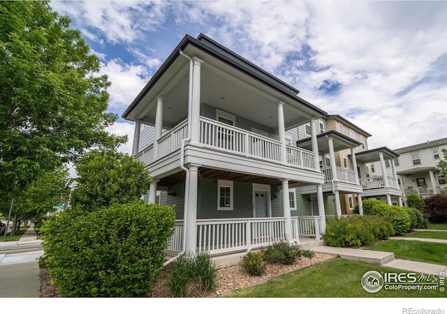 705 Rawlins Way, Lafayette, CO 80026 - view of front of house featuring a balcony and a porch