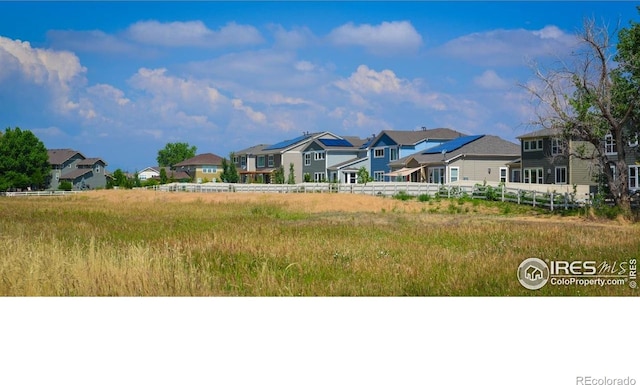 705 Rawlins Way, Lafayette, CO 80026 - rear view of house with a residential view