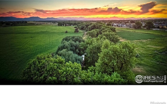705 Rawlins Way, Lafayette, CO 80026 - aerial view at dusk of a mountain view and a rural view