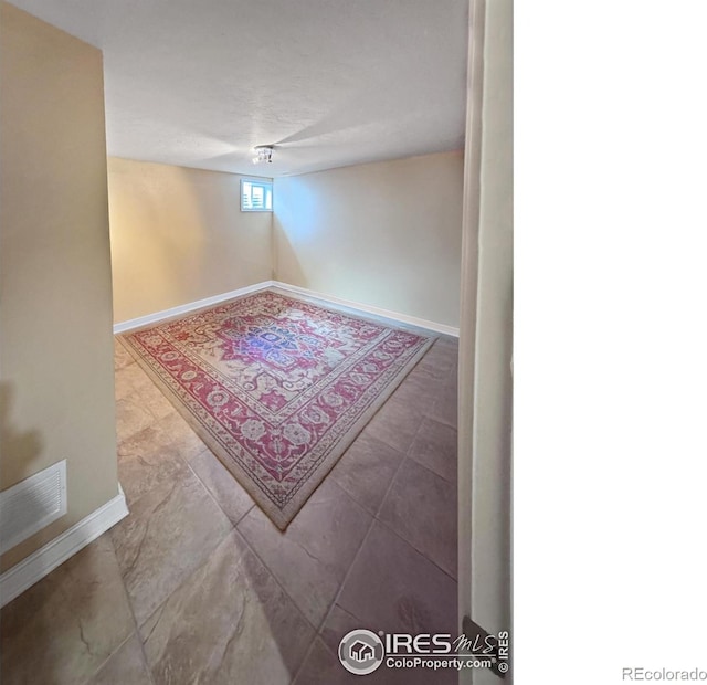8200 S Locust Way, Centennial, CO 80112 - empty room featuring baseboards