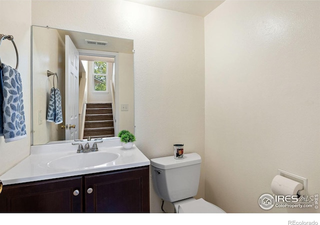 1215 Centaur Cir Unit A, Lafayette, CO 80026 - half bath featuring toilet and vanity