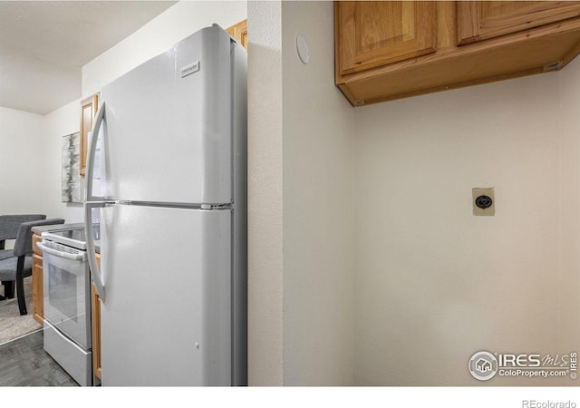 1215 Centaur Cir Unit A, Lafayette, CO 80026 - kitchen featuring freestanding refrigerator and range with electric stovetop