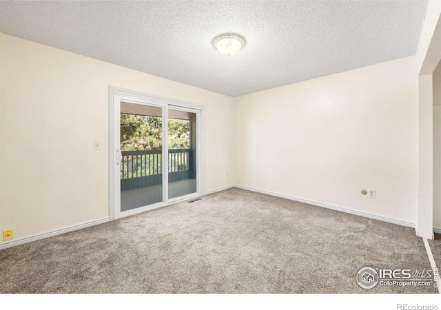 1215 Centaur Cir Unit A, Lafayette, CO 80026 - carpeted spare room with a textured ceiling and baseboards
