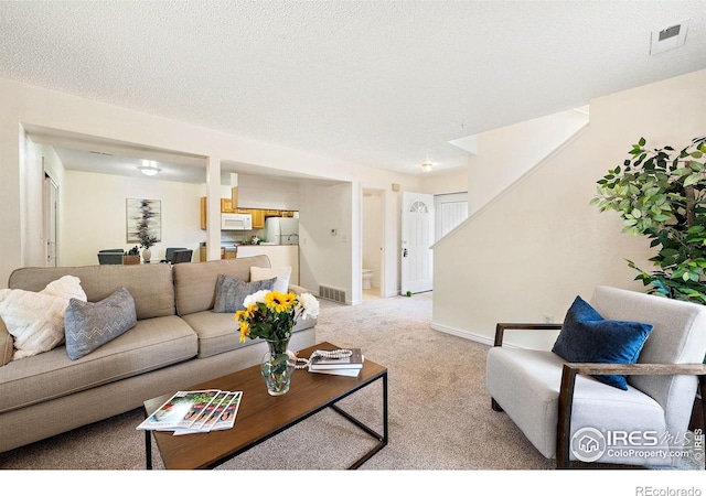 1215 Centaur Cir Unit A, Lafayette, CO 80026 - living room featuring light colored carpet