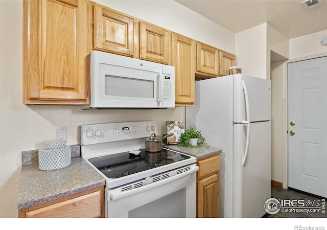 1215 Centaur Cir Unit A, Lafayette, CO 80026 - kitchen with white appliances and light countertops