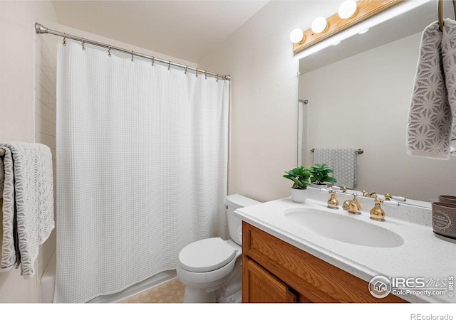 1215 Centaur Cir Unit A, Lafayette, CO 80026 - bathroom featuring vanity, toilet, and shower / bath combo with shower curtain