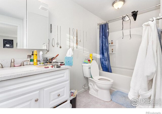 810 W Laurel St, Fort Collins, CO 80521 - bathroom with vanity, toilet, shower / bath combination with curtain, and baseboards