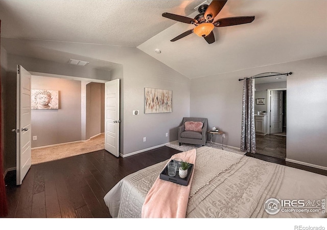 2190 Winding Dr, Longmont, CO 80504 - bedroom featuring wood-type flooring, vaulted ceiling, and ceiling fan