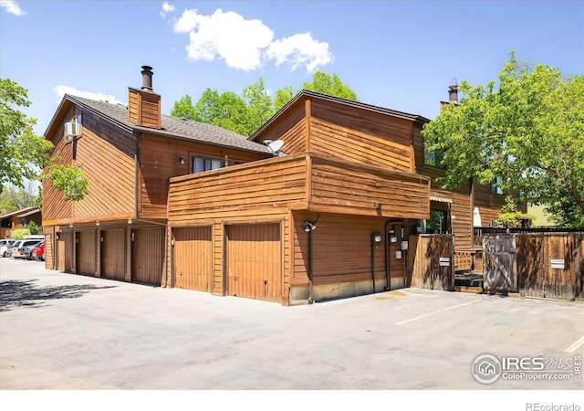 2725 Juniper Ave Unit 78, Boulder, CO 80304 - view of front of home featuring a chimney and a balcony