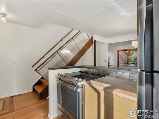 3345 Hickok Pl, Boulder, CO 80301 - kitchen with stainless steel appliances, light wood-style floors, and baseboards