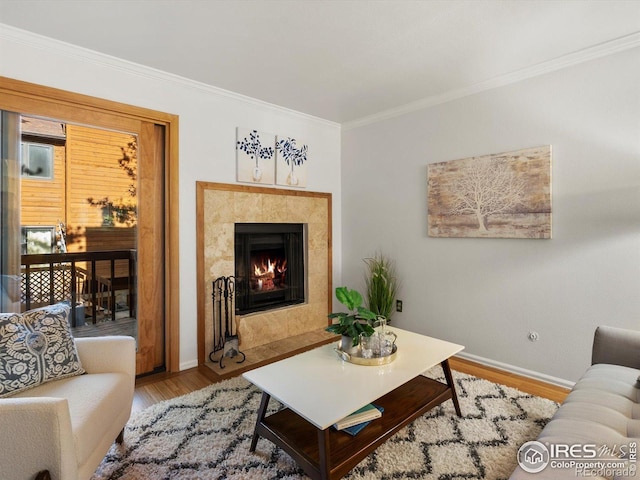 3345 Hickok Pl, Boulder, CO 80301 - living area with wood finished floors, baseboards, crown molding, and a high end fireplace