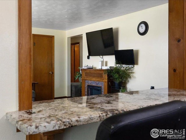 1815 9th Ave, Longmont, CO 80501 - living room with a glass covered fireplace