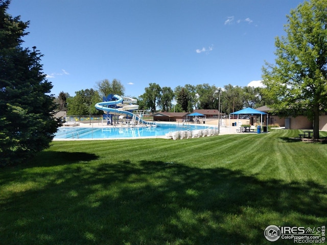 1815 9th Ave, Longmont, CO 80501 - community pool featuring a water slide