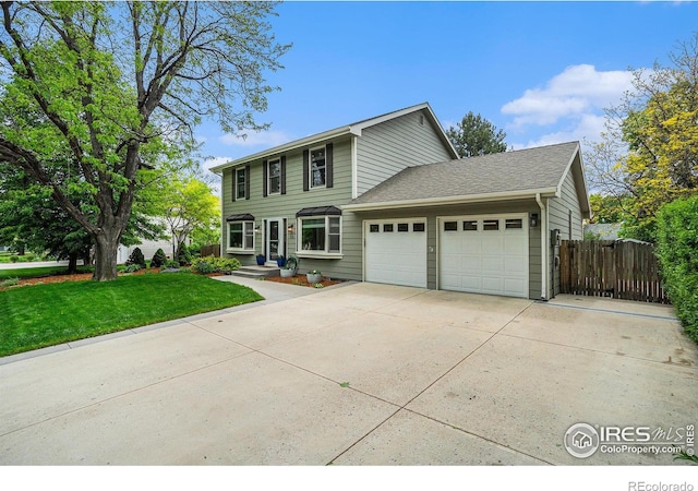 1119 Oakmont Ct, Fort Collins, CO 80525 - colonial-style house featuring a garage and driveway