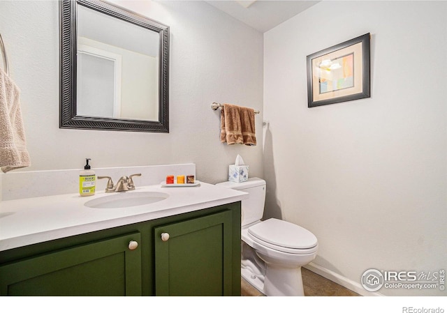 1119 Oakmont Ct, Fort Collins, CO 80525 - bathroom with vanity, toilet, and baseboards