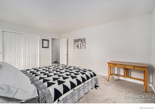 1119 Oakmont Ct, Fort Collins, CO 80525 - bedroom with carpet, a closet, and baseboards