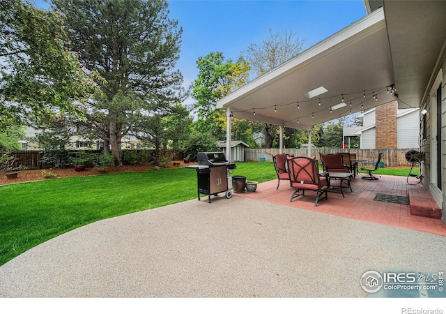 1119 Oakmont Ct, Fort Collins, CO 80525 - view of patio / terrace featuring area for grilling, outdoor dining space, and a storage shed