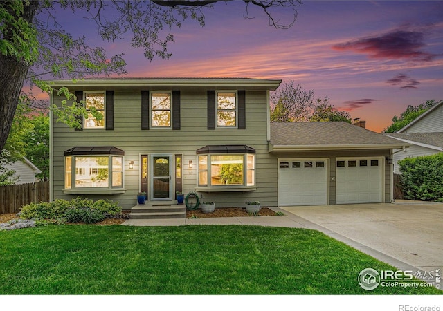 1119 Oakmont Ct, Fort Collins, CO 80525 - view of front of home featuring an attached garage and driveway