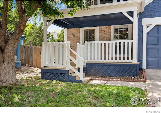 911 Homer Cir, Lafayette, CO 80026 - entrance to property with brick siding and covered porch