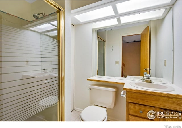 911 Homer Cir, Lafayette, CO 80026 - full bath featuring a stall shower, vanity, and toilet