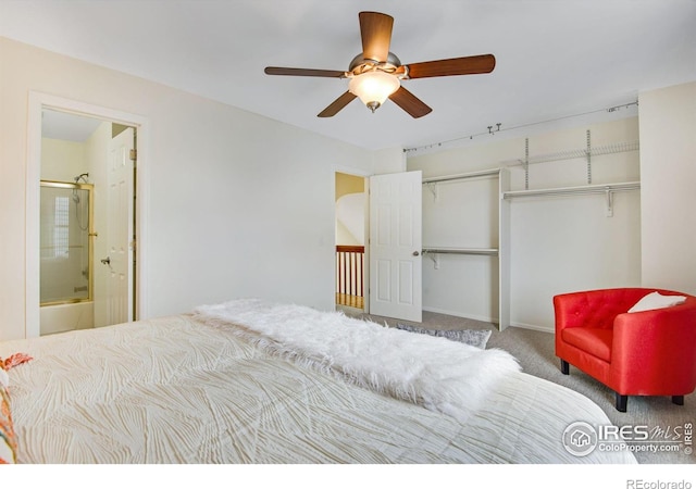 911 Homer Cir, Lafayette, CO 80026 - bedroom featuring carpet floors, connected bathroom, ceiling fan, and baseboards