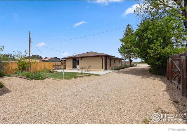 1217 N US Highway 287, Fort Collins, CO 80524 - view of front of house featuring a fenced backyard and a patio area