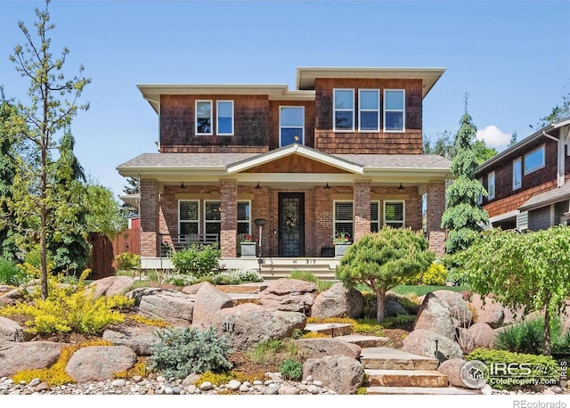 317 Wood St, Fort Collins, CO 80521 - view of front of home with covered porch and brick siding
