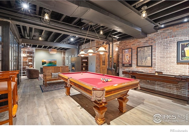 317 Wood St, Fort Collins, CO 80521 - rec room featuring brick wall, pool table, and wood finished floors