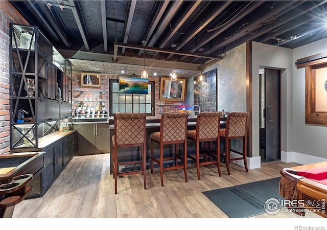 317 Wood St, Fort Collins, CO 80521 - indoor bar with wood finished floors and baseboards