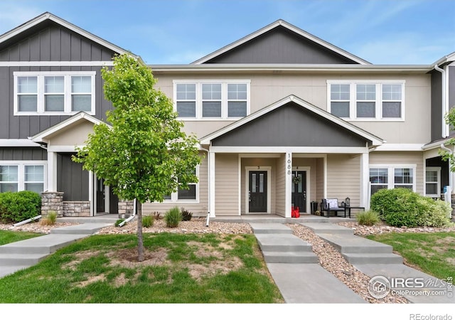 1688 Grand Ave # 3, Windsor, CO 80550 - townhome / multi-family property featuring a porch and board and batten siding