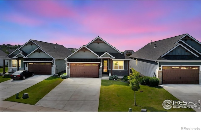 1948 Tidewater Ln, Windsor, CO 80550 - craftsman inspired home with a lawn, driveway, and a garage