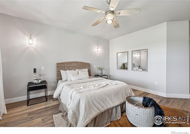 1948 Tidewater Ln, Windsor, CO 80550 - bedroom featuring baseboards, wood finished floors, and ceiling fan