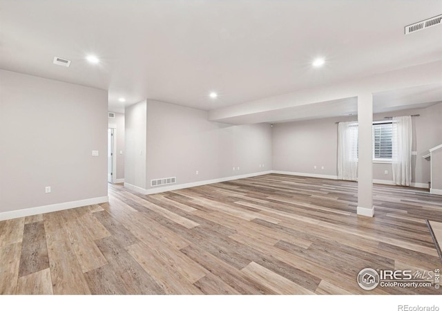 1948 Tidewater Ln, Windsor, CO 80550 - below grade area with recessed lighting, light wood-style flooring, and baseboards
