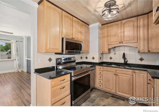 518 Whitmore Ct, Johnstown, CO 80534 - kitchen featuring appliances with stainless steel finishes, a sink, light brown cabinetry, crown molding, and wood ceiling