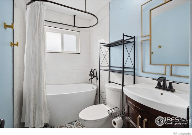 518 Whitmore Ct, Johnstown, CO 80534 - full bathroom featuring vanity, tile walls, toilet, and shower / bath combo